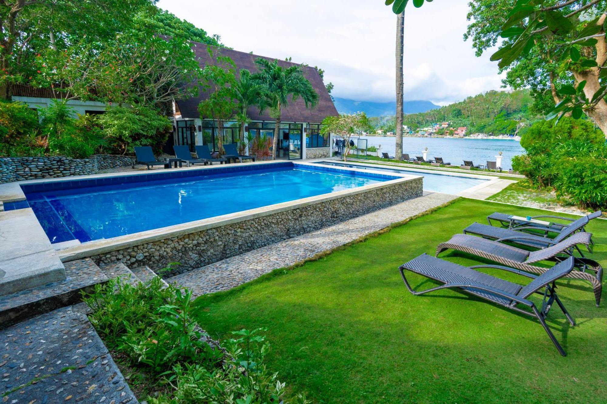 Casalay Boutique Villas & Dive Пуэрто-Галера Экстерьер фото